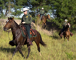 U.S. Border Patrol on horseback