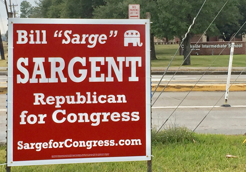 Weber campaign places signs to obscure those of his opponent.