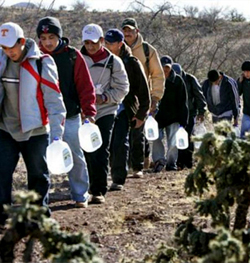 Illegal immigrants in a line